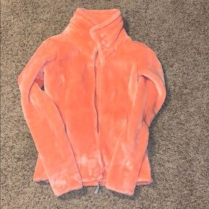 Bench, orange fleece jacket